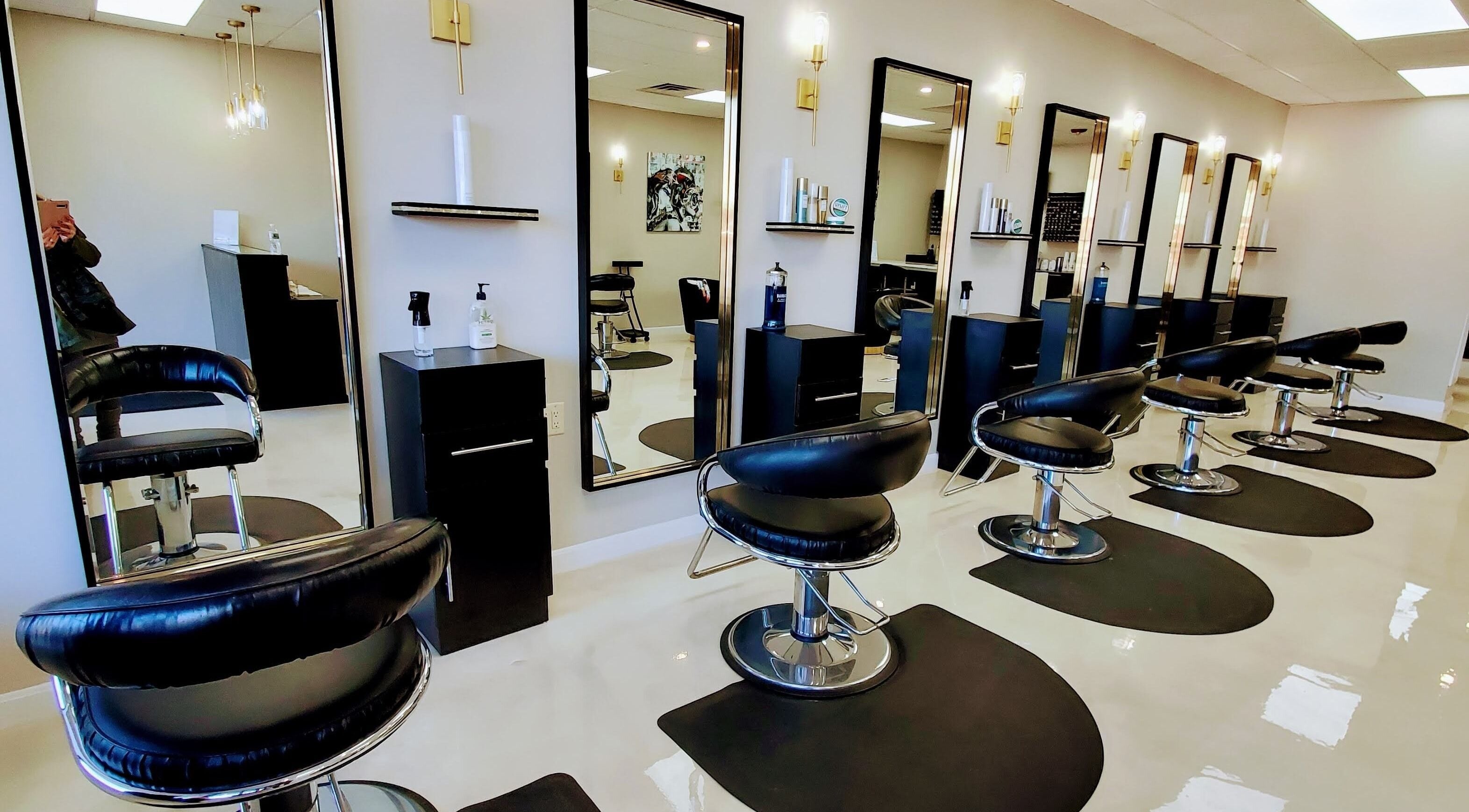 Stylish salon interior with modern chairs at Salon Secora, Saugus, Massachusetts, US.