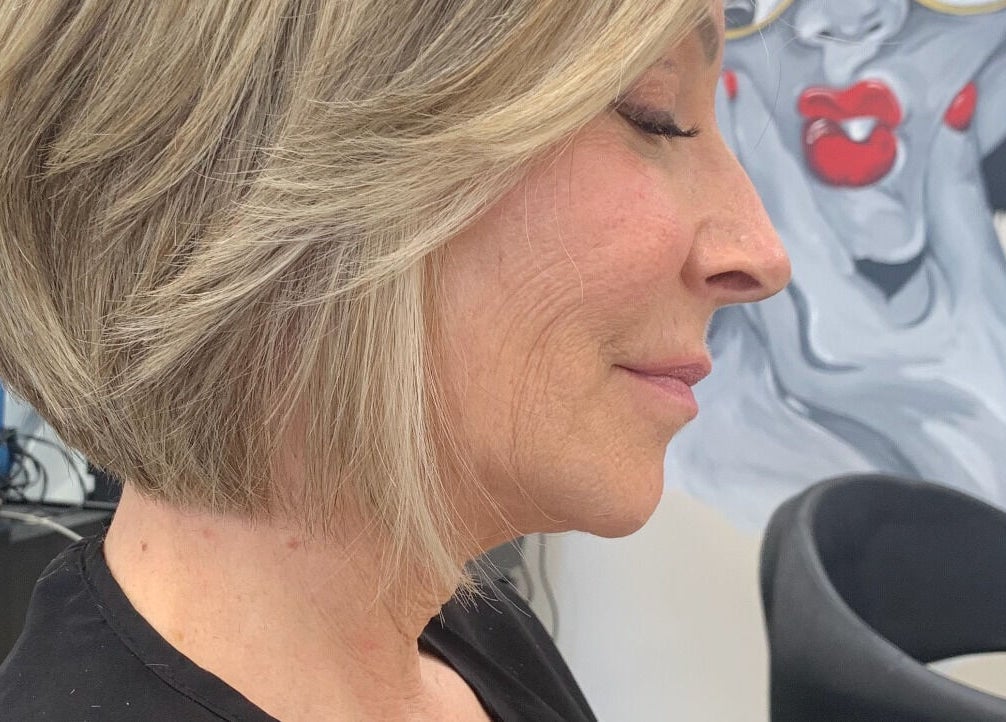 Elegant bob haircut at Salon Secora in Saugus, Massachusetts, US with a chic salon backdrop.