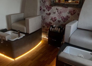 Pedicure chairs at Totally Polished Beauty & Nails in Drighlington, England, GB showcasing opulent comfort.