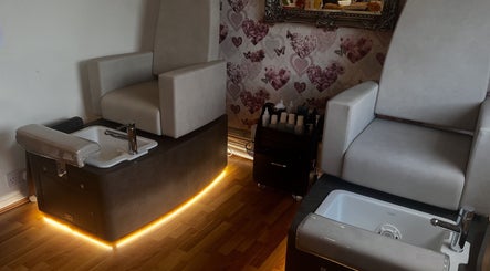 Pedicure chairs at Totally Polished Beauty & Nails in Drighlington, England, GB showcasing opulent comfort.