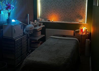 Peaceful treatment room at Totally Polished Beauty & Nails in Drighlington, England, GB with soft lighting.
