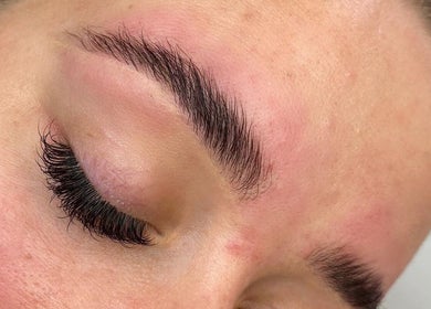 Close-up of expertly done eyelashes and brows at Belles Beauty, Hemel Hempstead, England, GB.