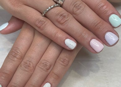 Elegant pastel nail art by Belles Beauty, Hemel Hempstead, England. Perfect for pampering sessions.