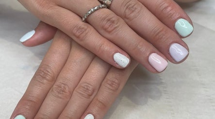 Elegant pastel nail art by Belles Beauty, Hemel Hempstead, England. Perfect for pampering sessions.