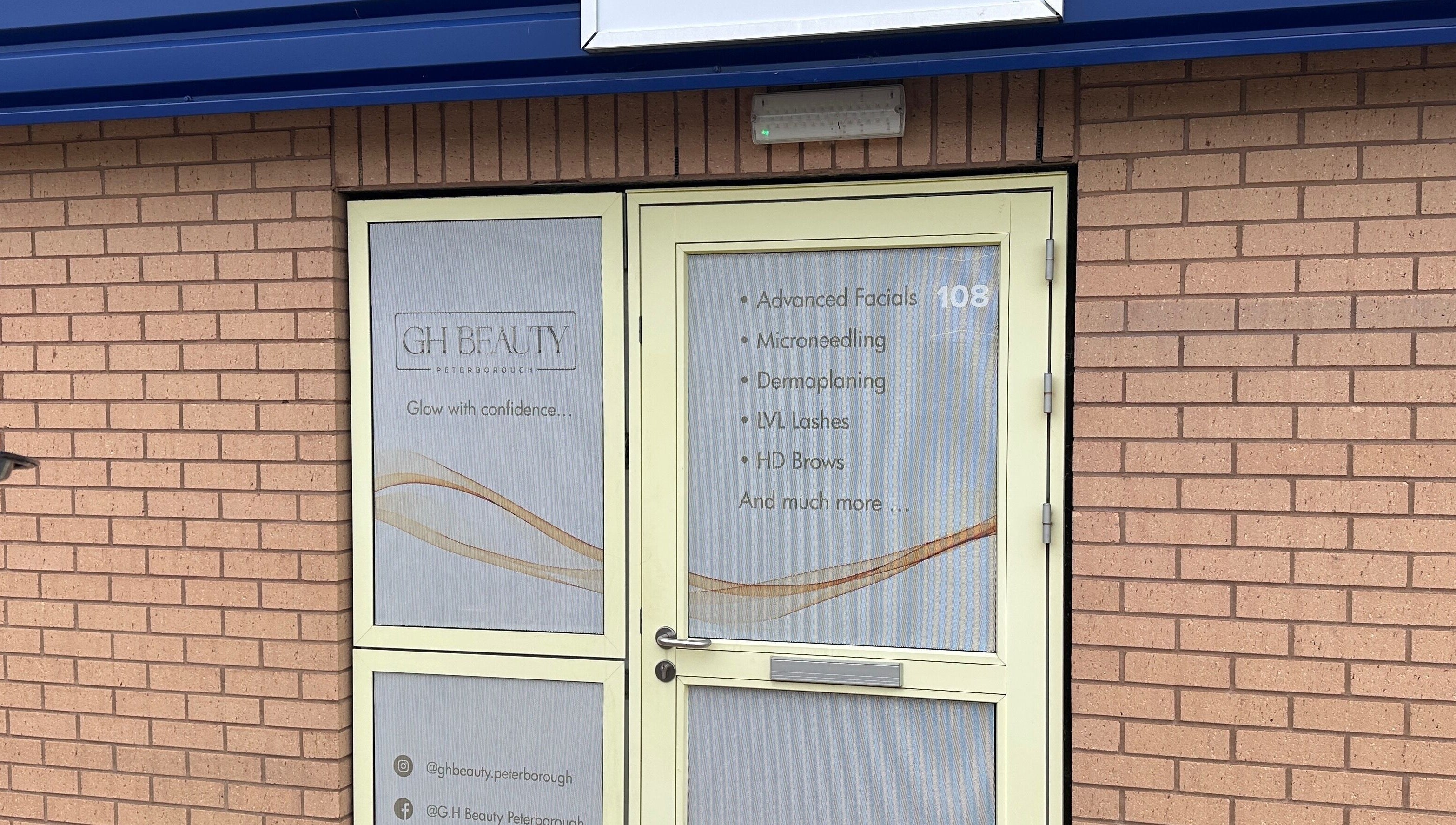 Entrance of GH Beauty in Peterborough, England, GB showcasing services like facials and microneedling.
