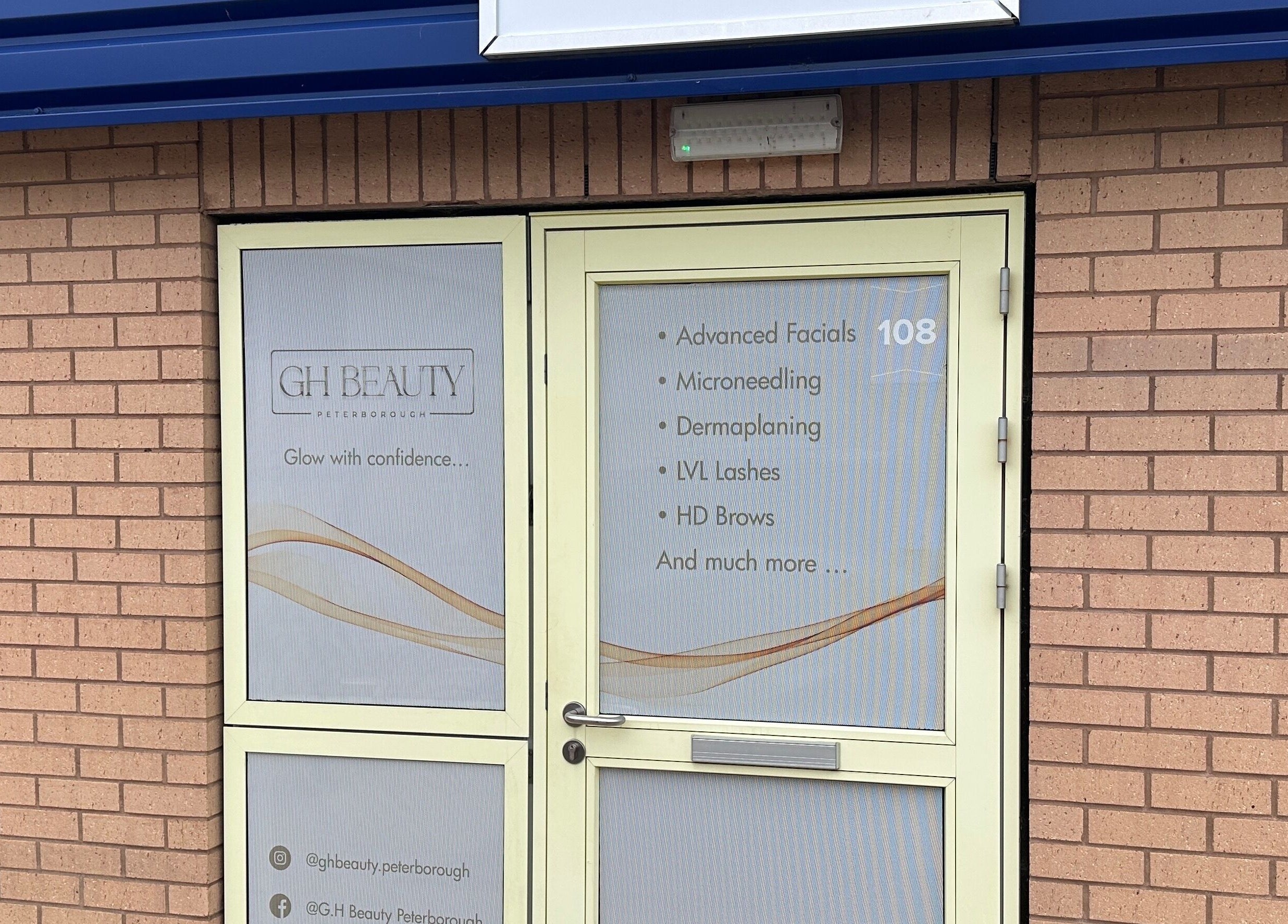 Entrance of GH Beauty in Peterborough, England, GB showcasing services like facials and microneedling.