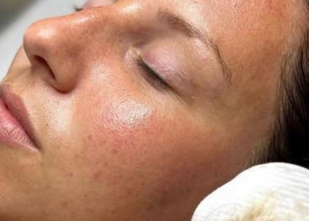 Close-up of a relaxed face during a facial at GH Beauty, Peterborough, England, GB.