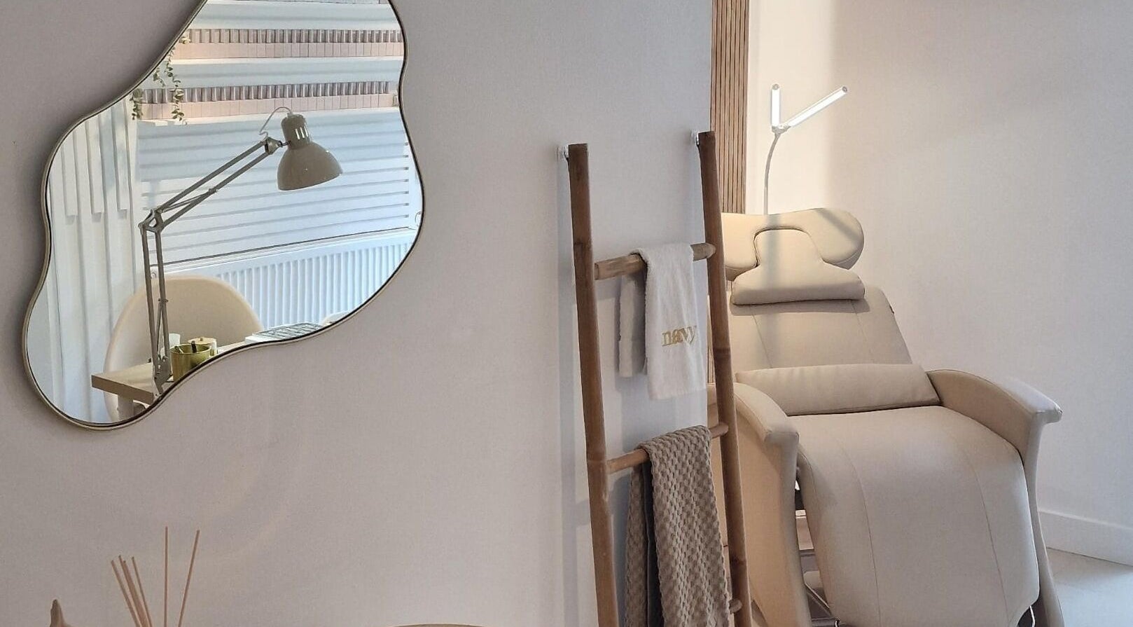 Chic treatment area at Rich Hair & Beauty Salon, Hyde, England, GB featuring modern chair and stylish decor.