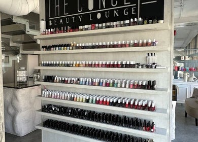 Nail polish display at The Concept Beauty Lounge, Amman, Amman Governorate, JO, showcasing vibrant choices.