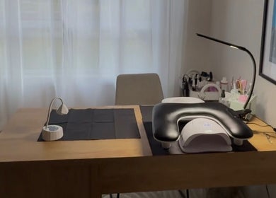 Nail salon setup at Luna-Luxe Beauty Bar, Geelong, Victoria, AU with lamp and manicure tools.