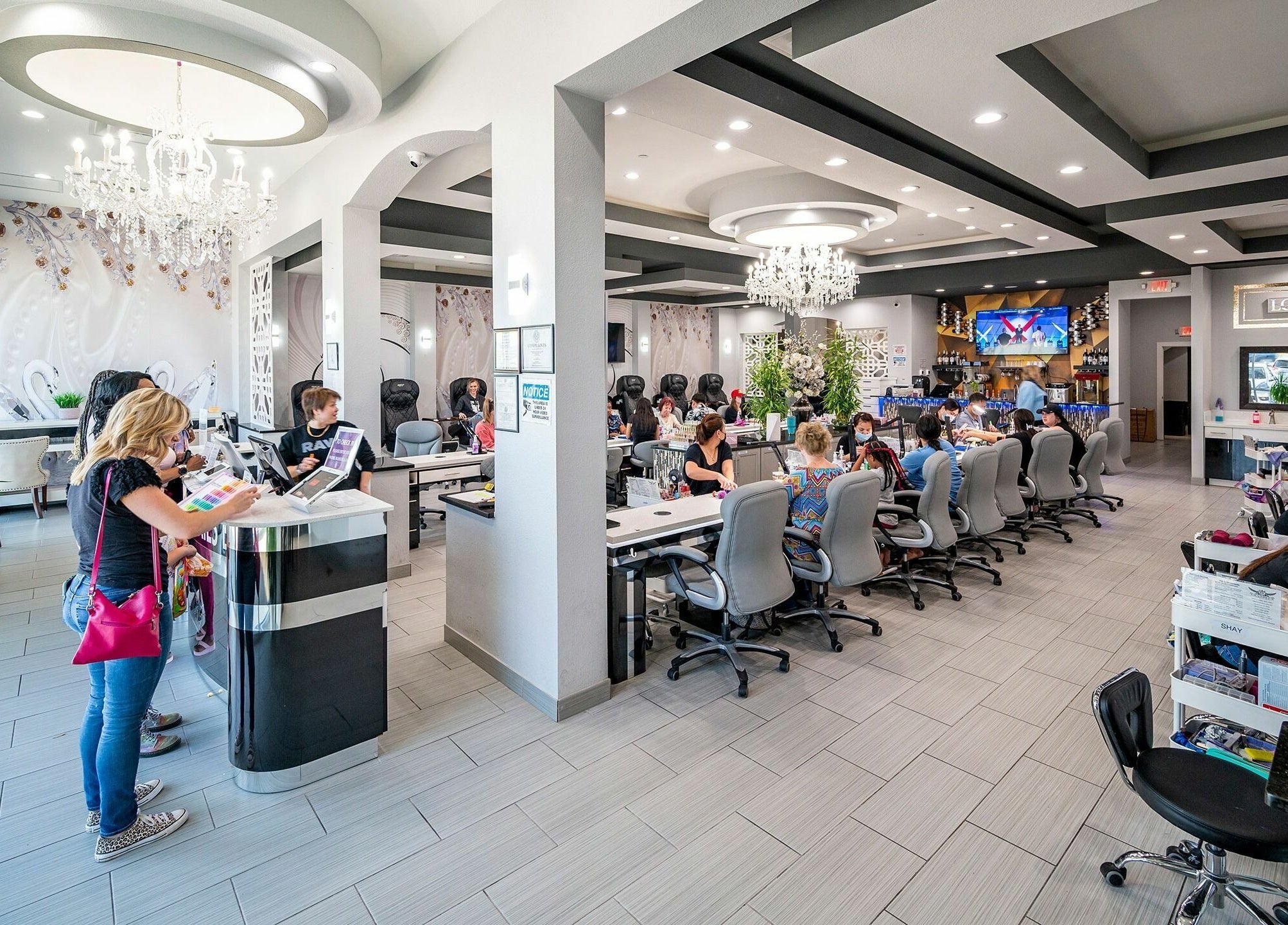 Interior of GrandLux Nails Spa in Round Rock, Texas, US showcasing a chic and modern nail salon environment.
