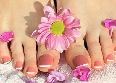 Beautiful floral pedicure at GrandLux Nails Spa, Round Rock, Texas, US, showcasing elegant nail art.