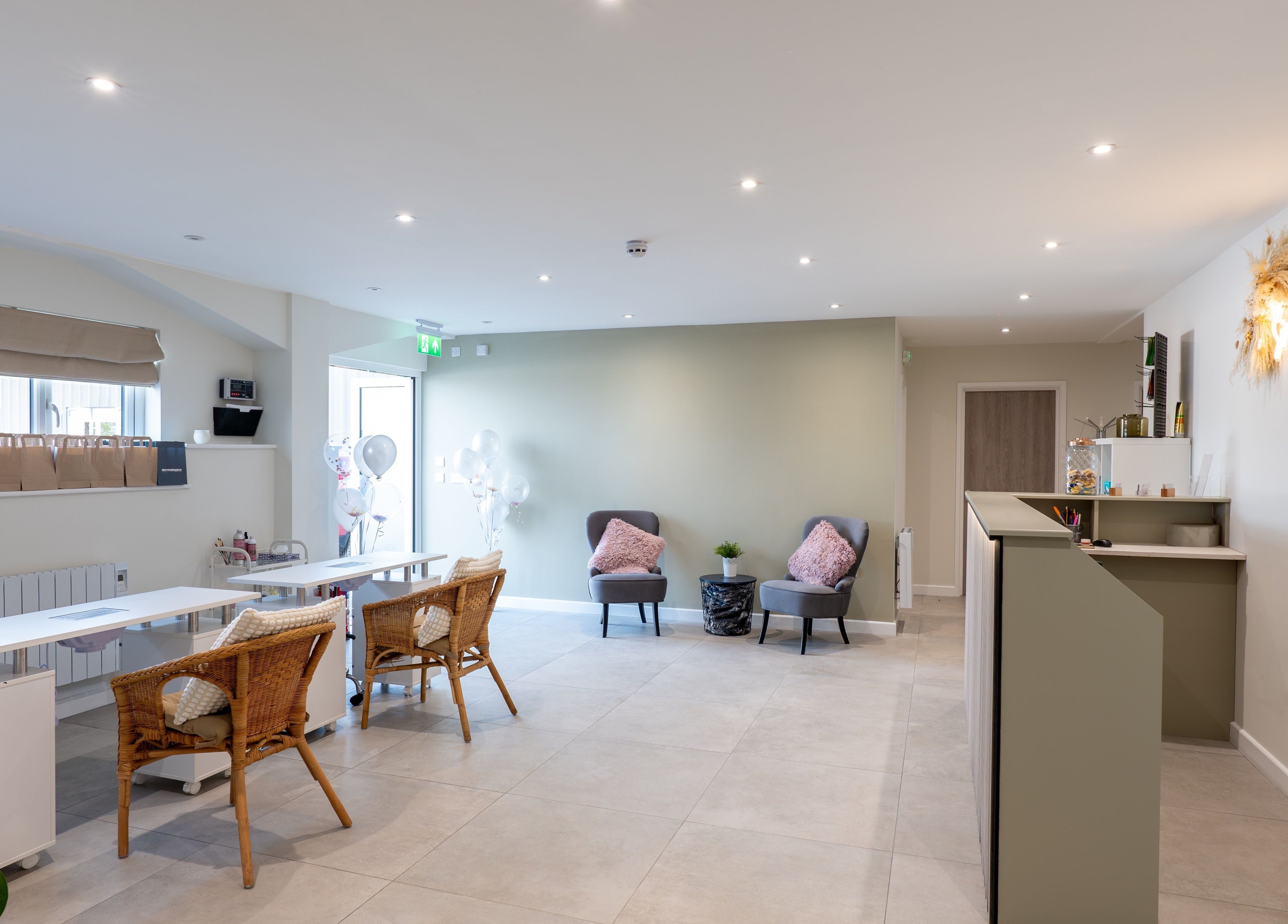 Bright, chic interior of Simple Beauty salon in Cullompton, England, GB with stylish seating and decor.