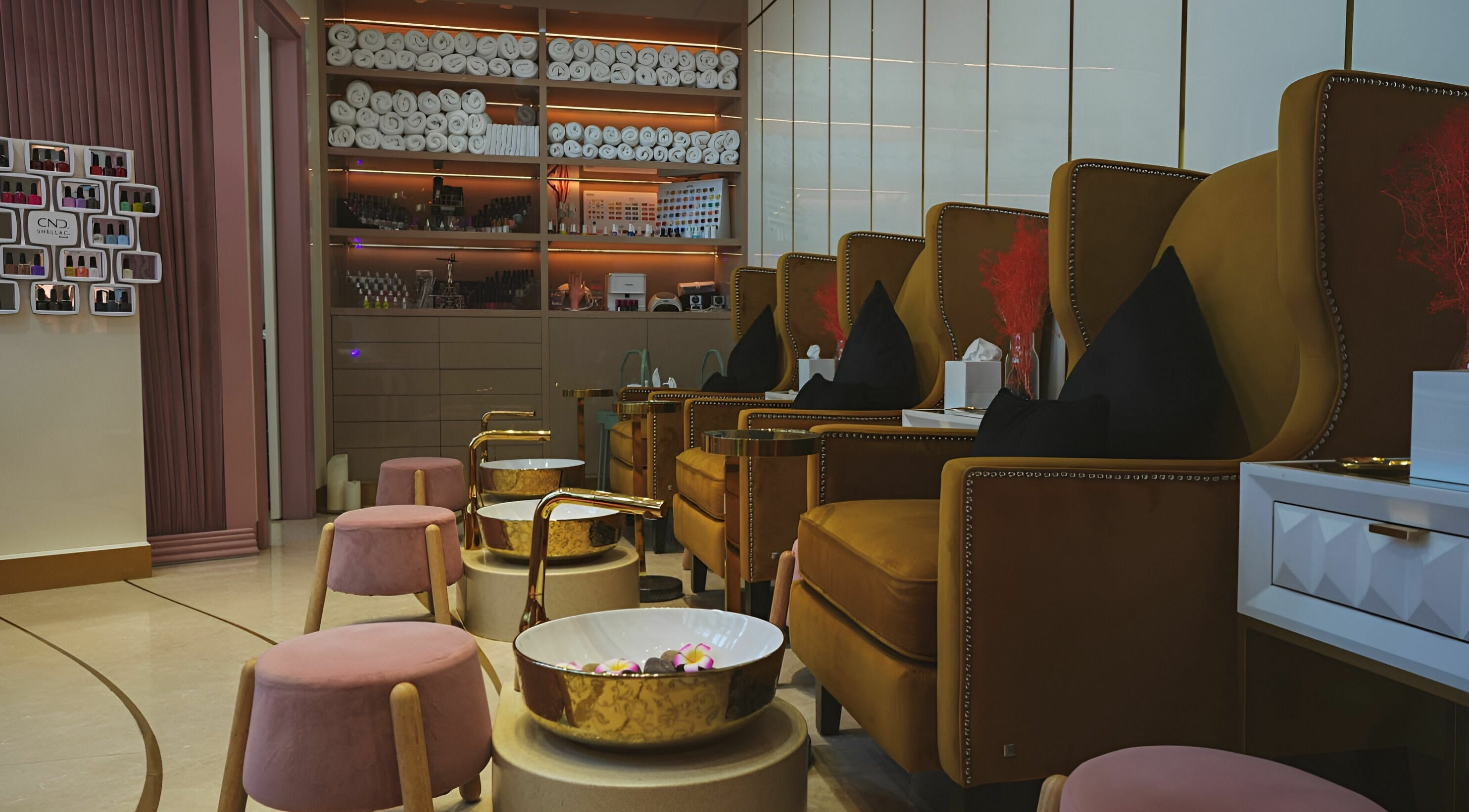 Elegant interior of Chi Chi Nail Beauty Salon, Doha, Doha, QA with plush seating and manicure stations.