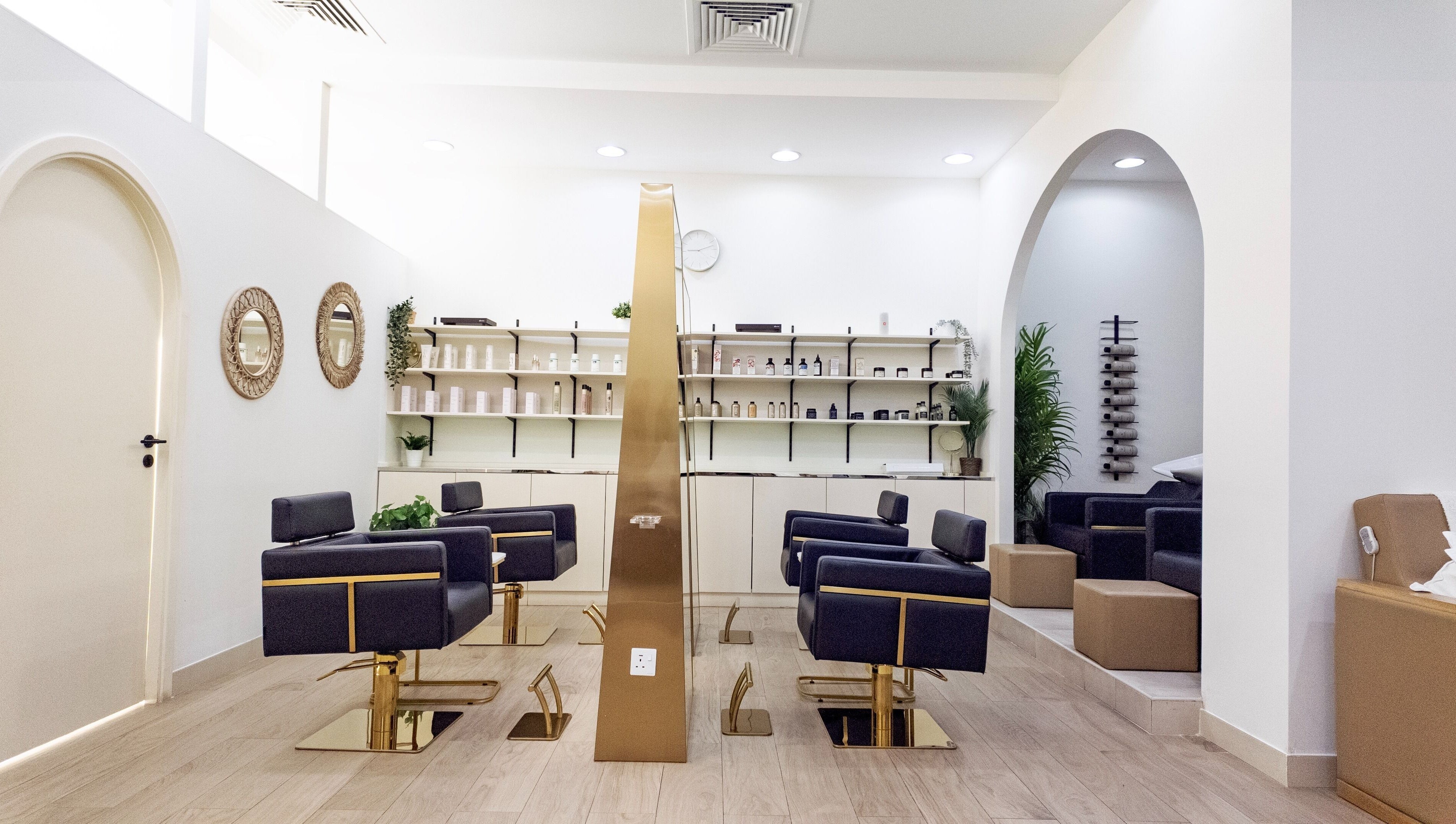 Elegant interior of Soak Salon in Dubai, AE with modern chairs and stylish decor.