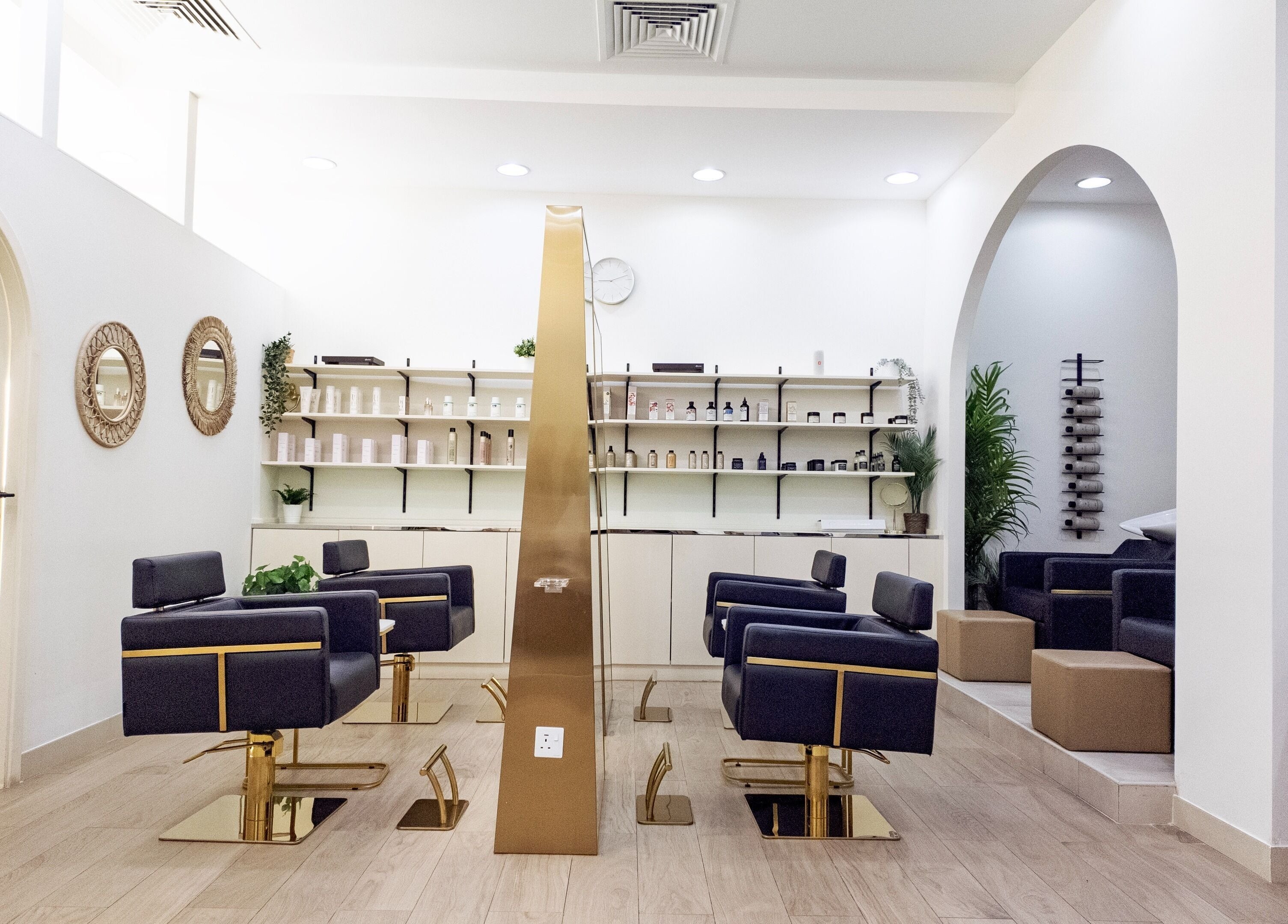 Elegant interior of Soak Salon in Dubai, AE with modern chairs and stylish decor.