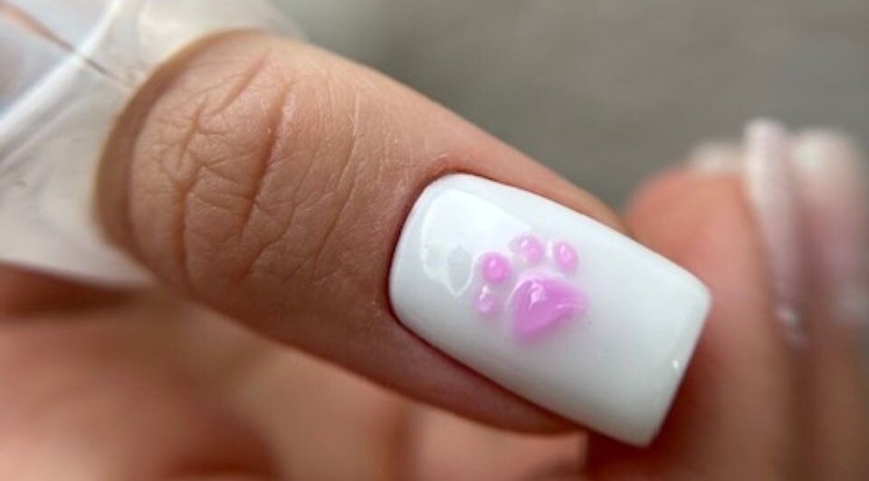 Unique paw design nail art by Skin & Nail Story | Takapuna in Auckland, Auckland, NZ. Perfect for stylish, pet-loving clients.