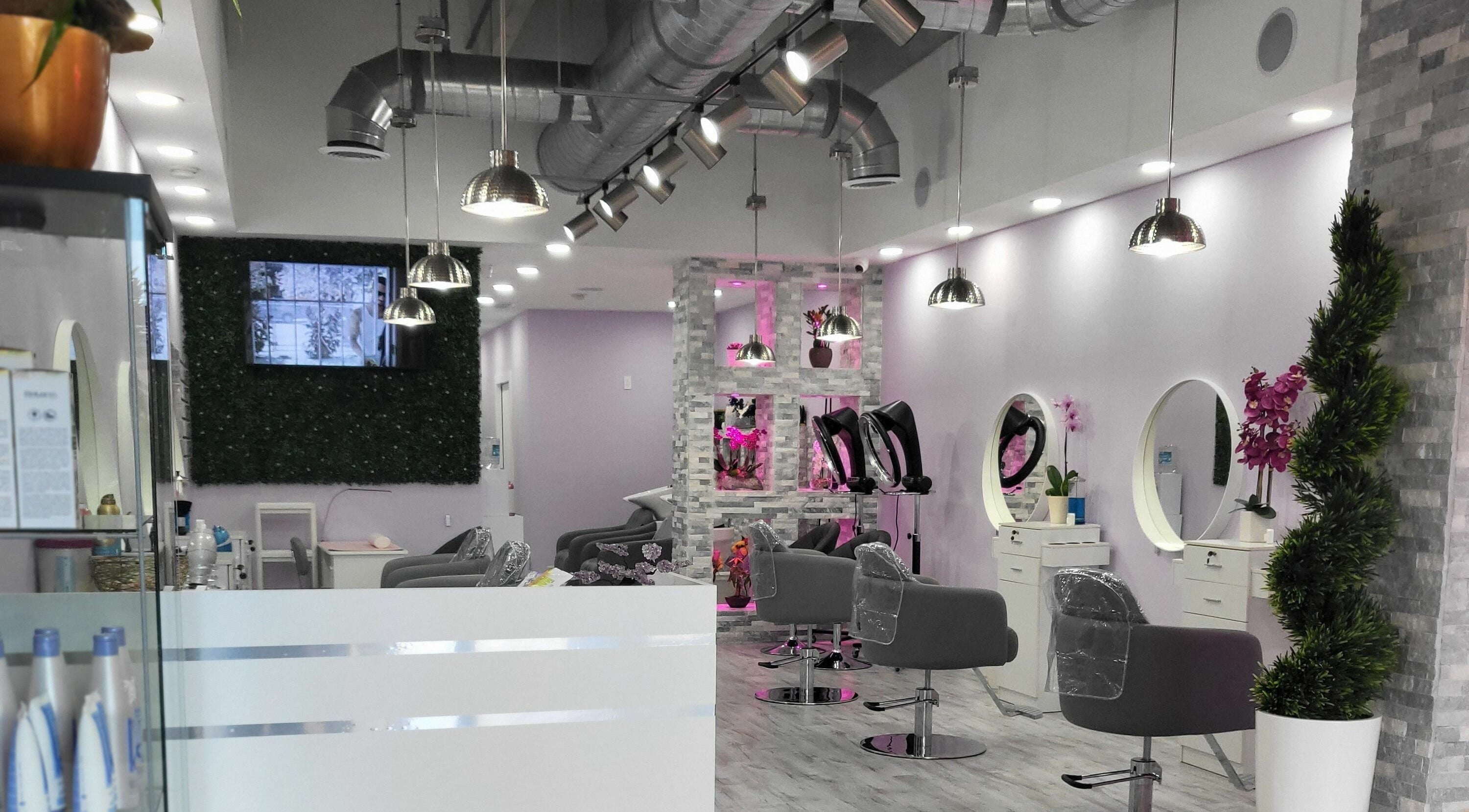 Chic interior of Sensational Hair Salon & Spa by Lizy in Miami, Florida, US featuring stylish decor and salon chairs.