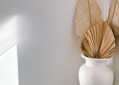 Elegant vase with dried leaves at Coastal Lash Co., Maroochydore, Queensland, AU