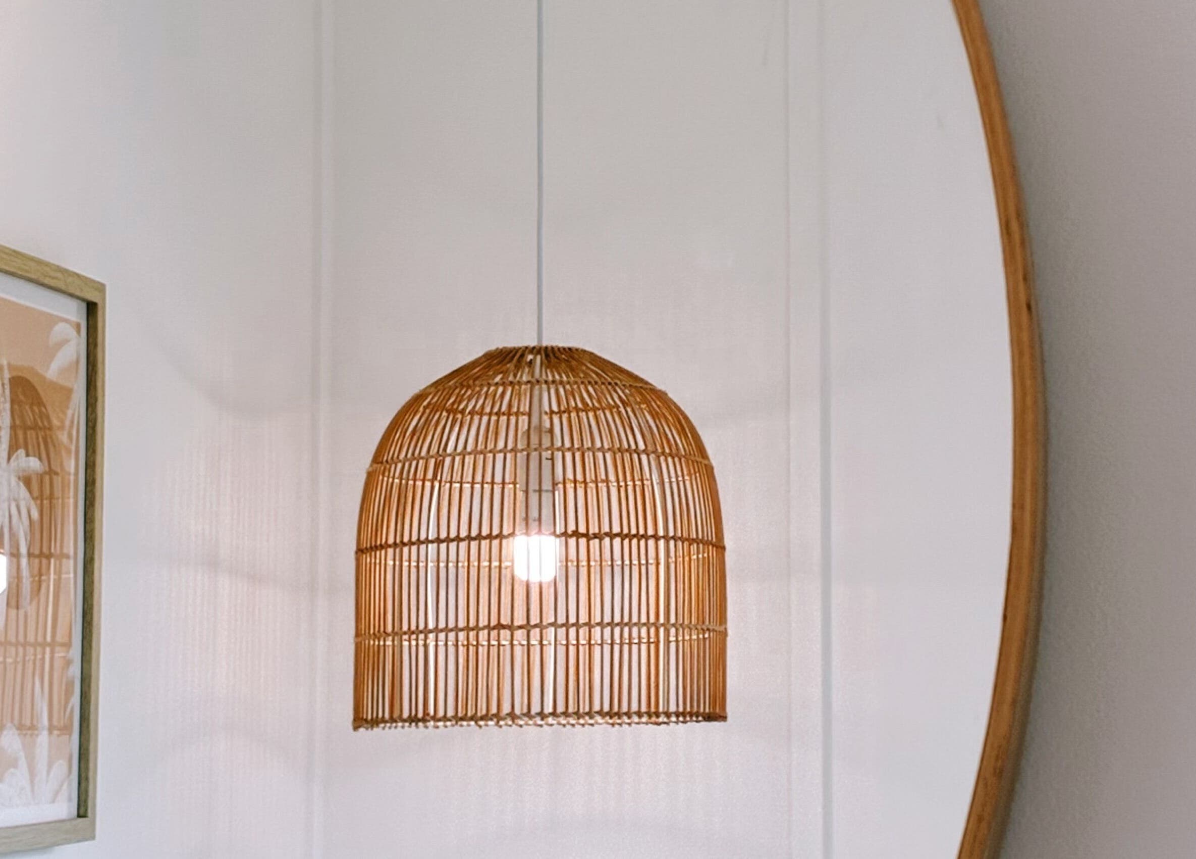 Elegant bamboo lamp and artwork at Coastal Lash Co., Maroochydore, Queensland, AU exemplify a serene decor style.