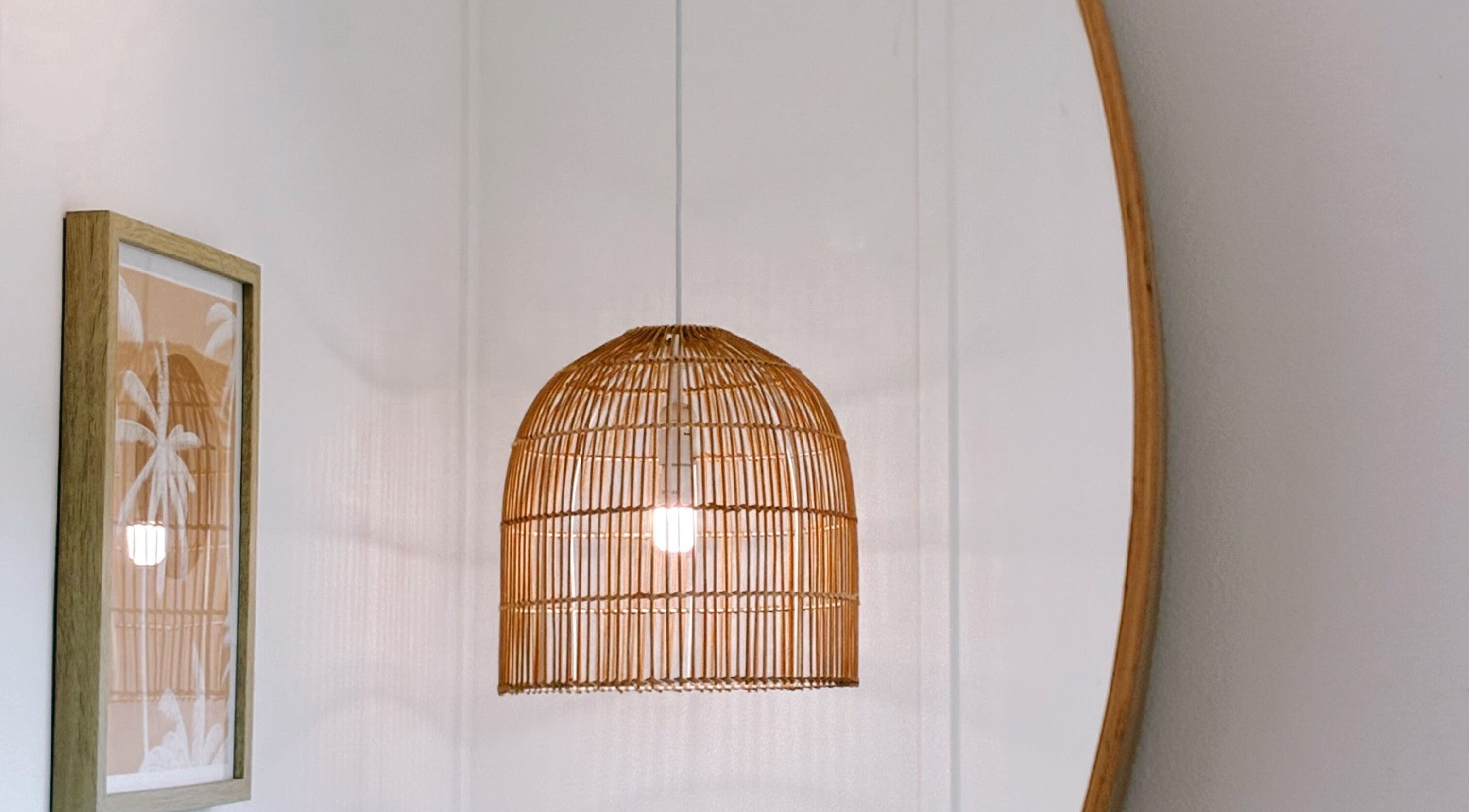 Elegant bamboo lamp and artwork at Coastal Lash Co., Maroochydore, Queensland, AU exemplify a serene decor style.