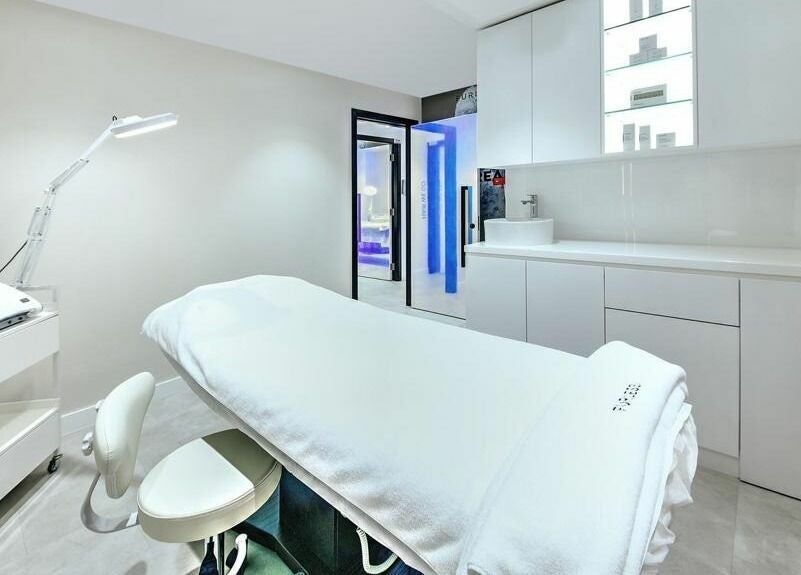 Elegant treatment room at Furless Coca Cola Arena, SZR Dubai, AE, featuring sophisticated electrolysis equipment.
