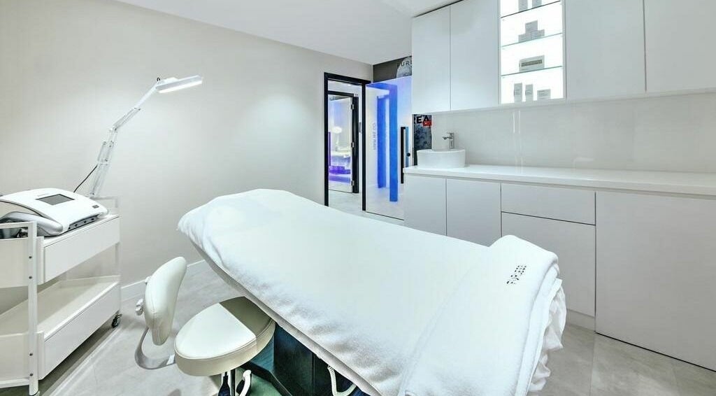 Elegant treatment room at Furless Coca Cola Arena, SZR Dubai, AE, featuring sophisticated electrolysis equipment.