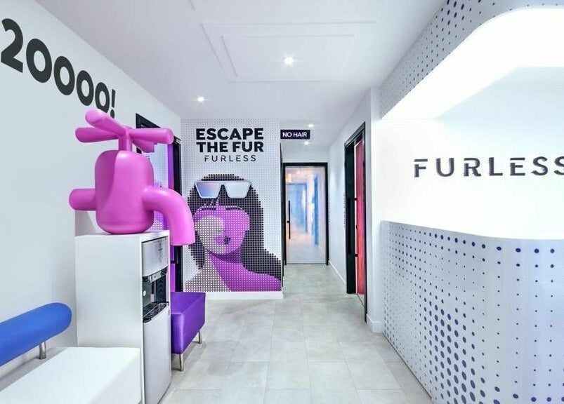 Furless Permanent Coca Cola Arena- SZR Dubai reception area with modern decor and vibrant colors. Dubai, AE.