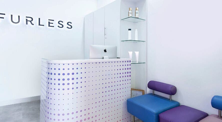 Modern reception area of Furless Permanent Muroor Road in Abu Dhabi, AE, featuring sleek design and comfortable seating.