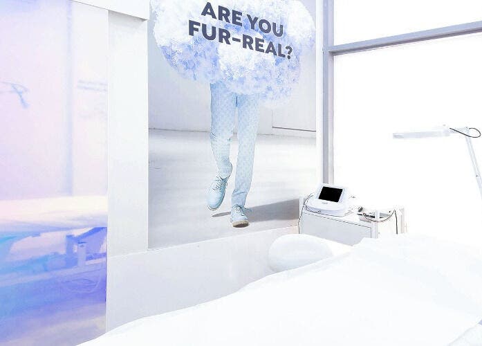 Furless Permanent Muroor Road clinic in Abu Dhabi features a serene, modern treatment room with electrolysis equipment.