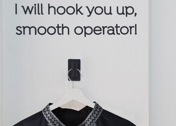 Creative wall sign and robe at Furless Permanent Muroor Road (Abu Dhabi/Electrolysis), Abu Dhabi, AE.