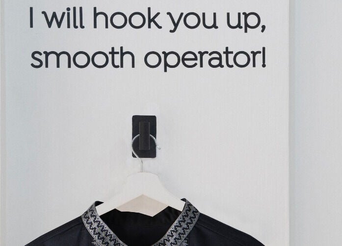 Creative wall sign and robe at Furless Permanent Muroor Road (Abu Dhabi/Electrolysis), Abu Dhabi, AE.