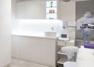 Sleek and modern interior of Furless Permanent Al Quoz, Dubai, AE, highlighting electrolysis treatment space.