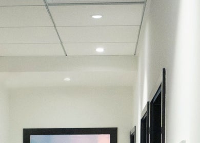 Modern corridor at Furless Permanent Al Quoz, Dubai AE, showcasing sleek design and ambient lighting.
