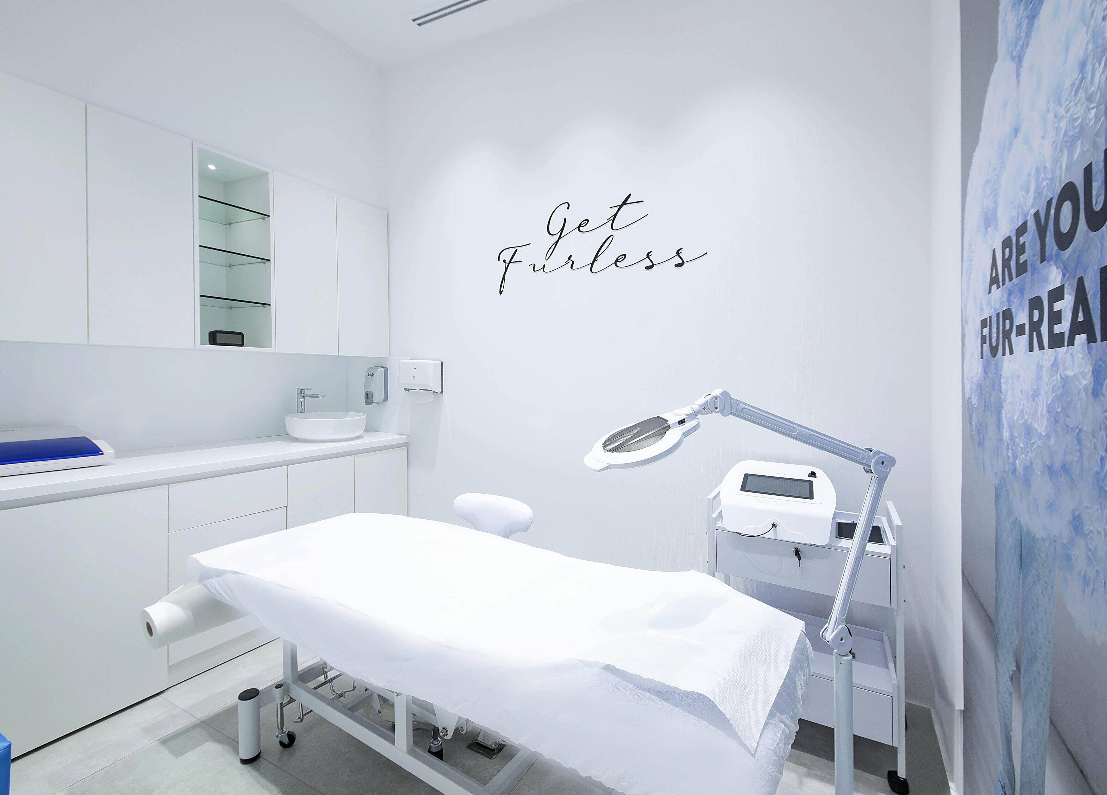 Bright, modern treatment room at Furless Permanent Rabdan Mall in Abu Dhabi, AE, featuring electrolysis equipment.