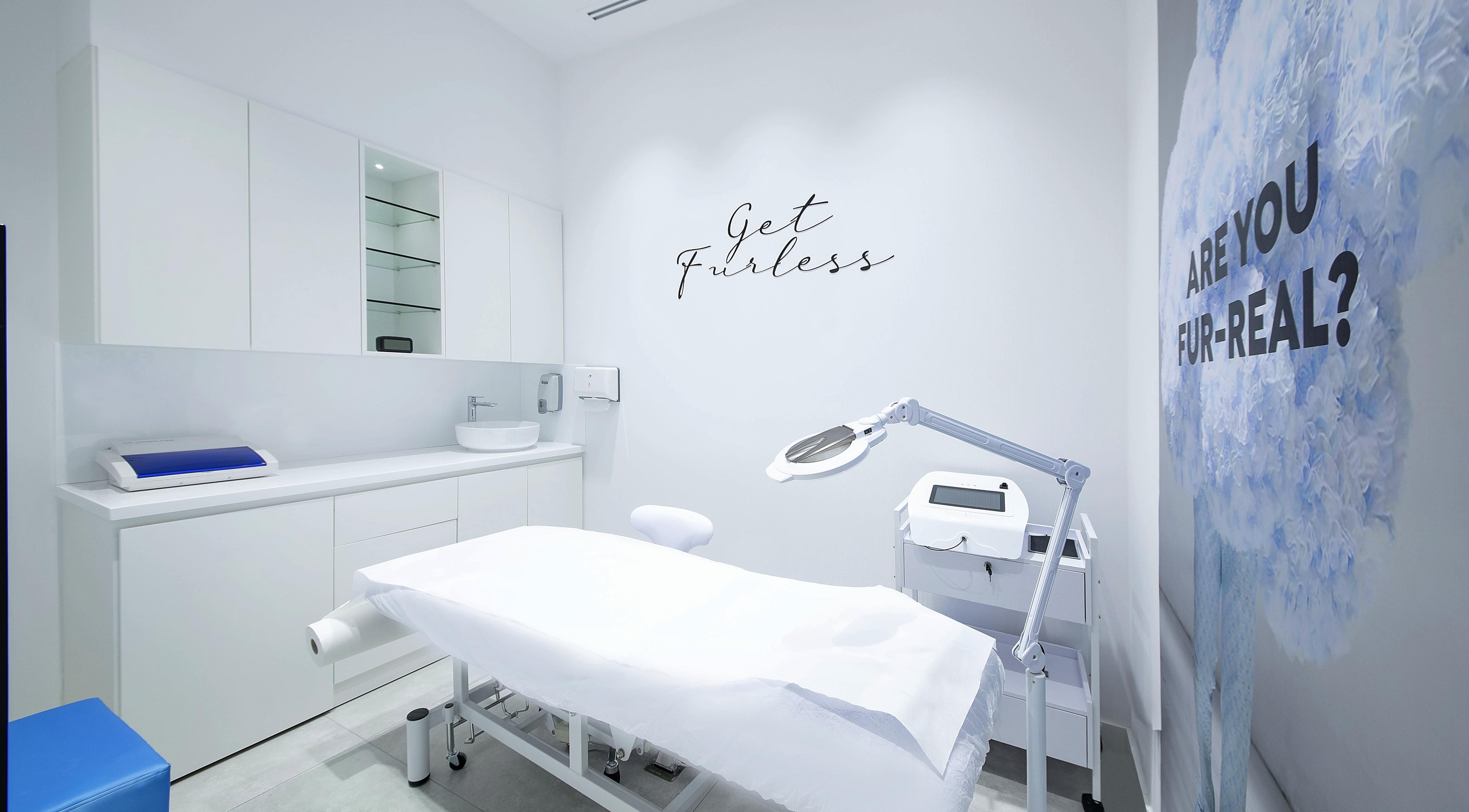 Bright, modern treatment room at Furless Permanent Rabdan Mall in Abu Dhabi, AE, featuring electrolysis equipment.