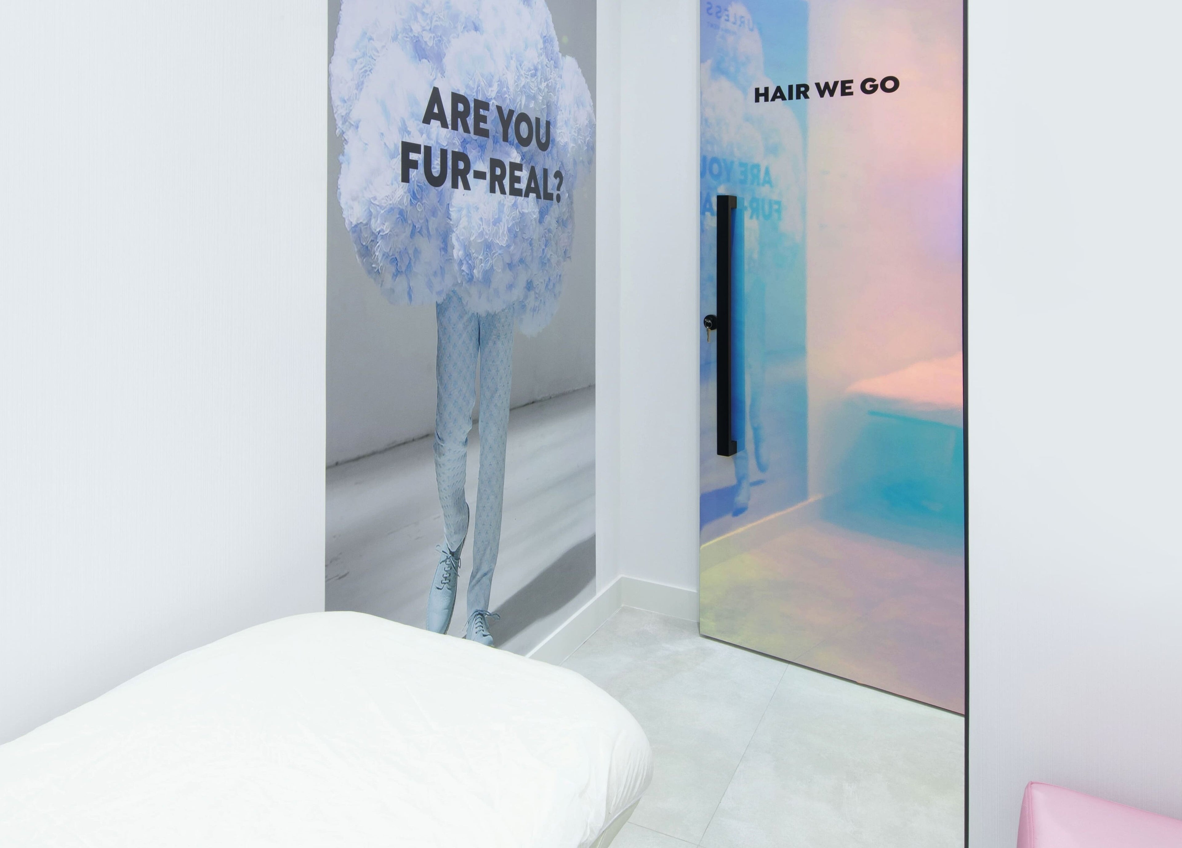 Modern treatment room at Furless Permanent Rabdan Mall, Abu Dhabi. Stylish decor with 'Are You Fur-real?' artwork.