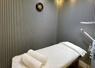 Tranquil massage room at BRILLIANT STYLES GENTS SALON - SPA, Dubai, offering relaxation in Al Barsha 1.