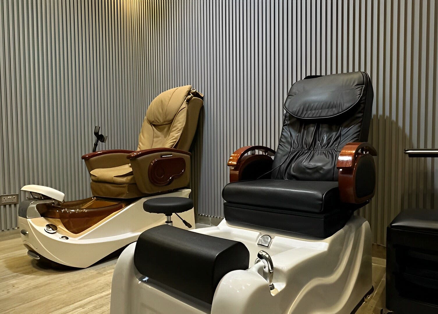 Luxurious pedicure chairs at Brilliant Styles Gents Salon, دبي Dubai, offering premium services.