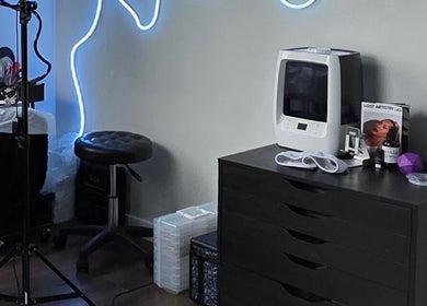 Modern beauty setup at Looks by Lew, Maple Ridge, British Columbia, CA features sleek equipment and ambient lighting.