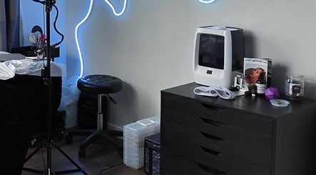 Modern beauty setup at Looks by Lew, Maple Ridge, British Columbia, CA features sleek equipment and ambient lighting.