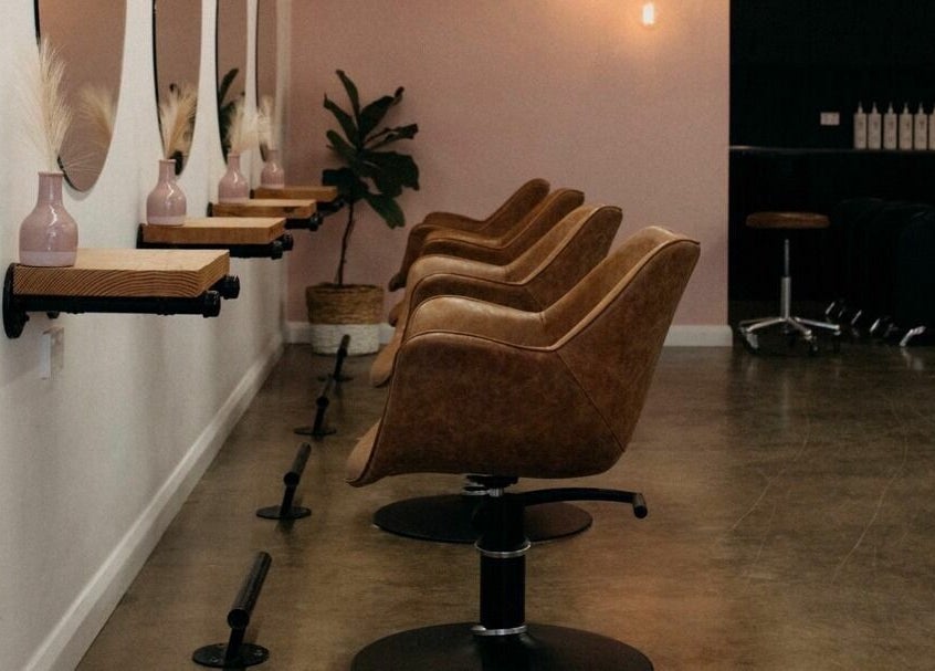 Stylish salon chairs and decor at The Color Room Glenbrook, Glenbrook, New South Wales, AU, showcasing modern elegance.