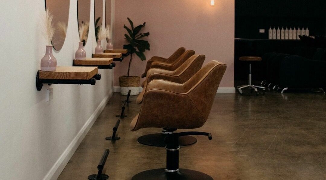 Stylish salon chairs and decor at The Color Room Glenbrook, Glenbrook, New South Wales, AU, showcasing modern elegance.