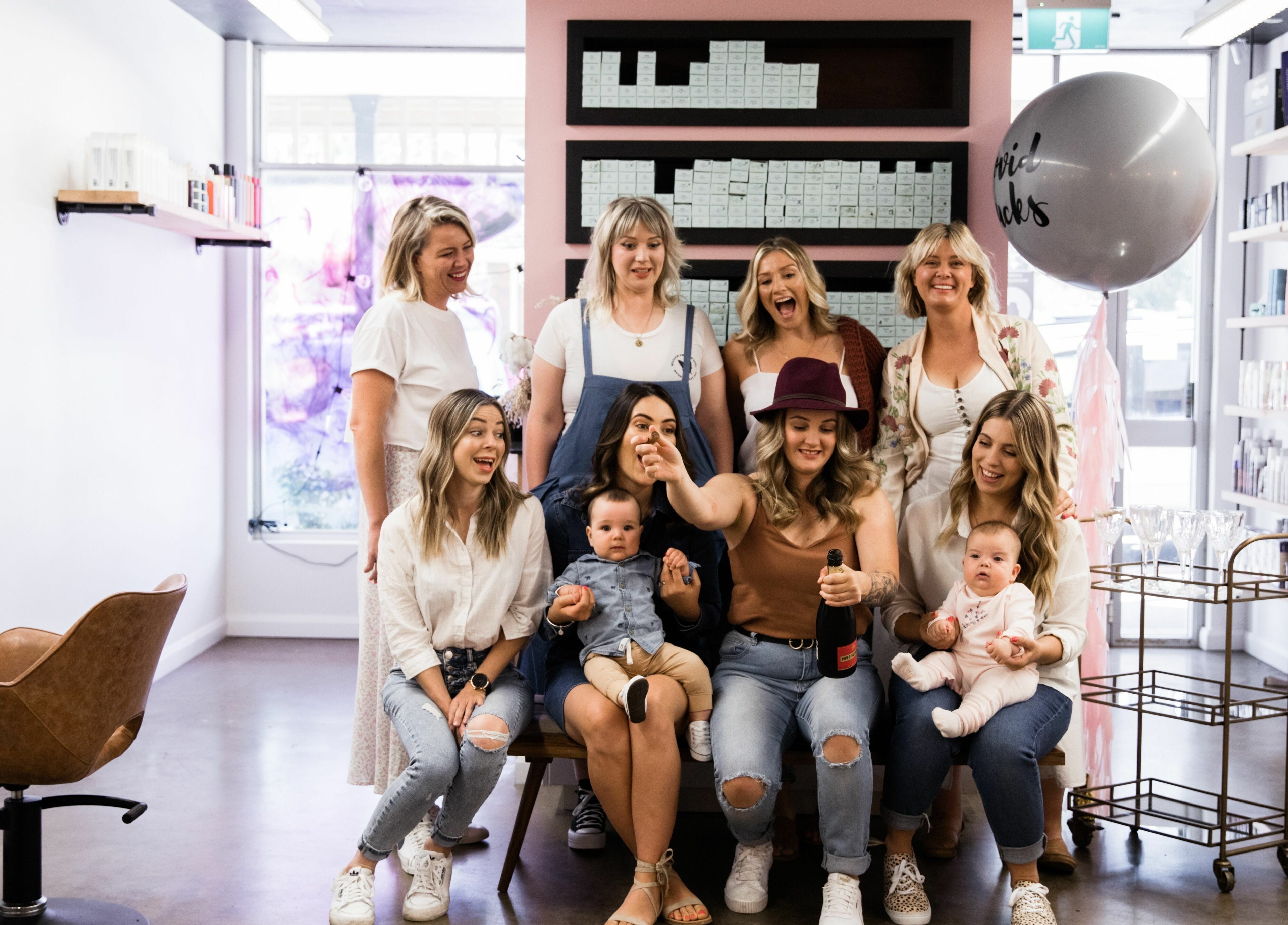 Happy team at The Color Room Glenbrook, New South Wales, AU celebrating in the salon.
