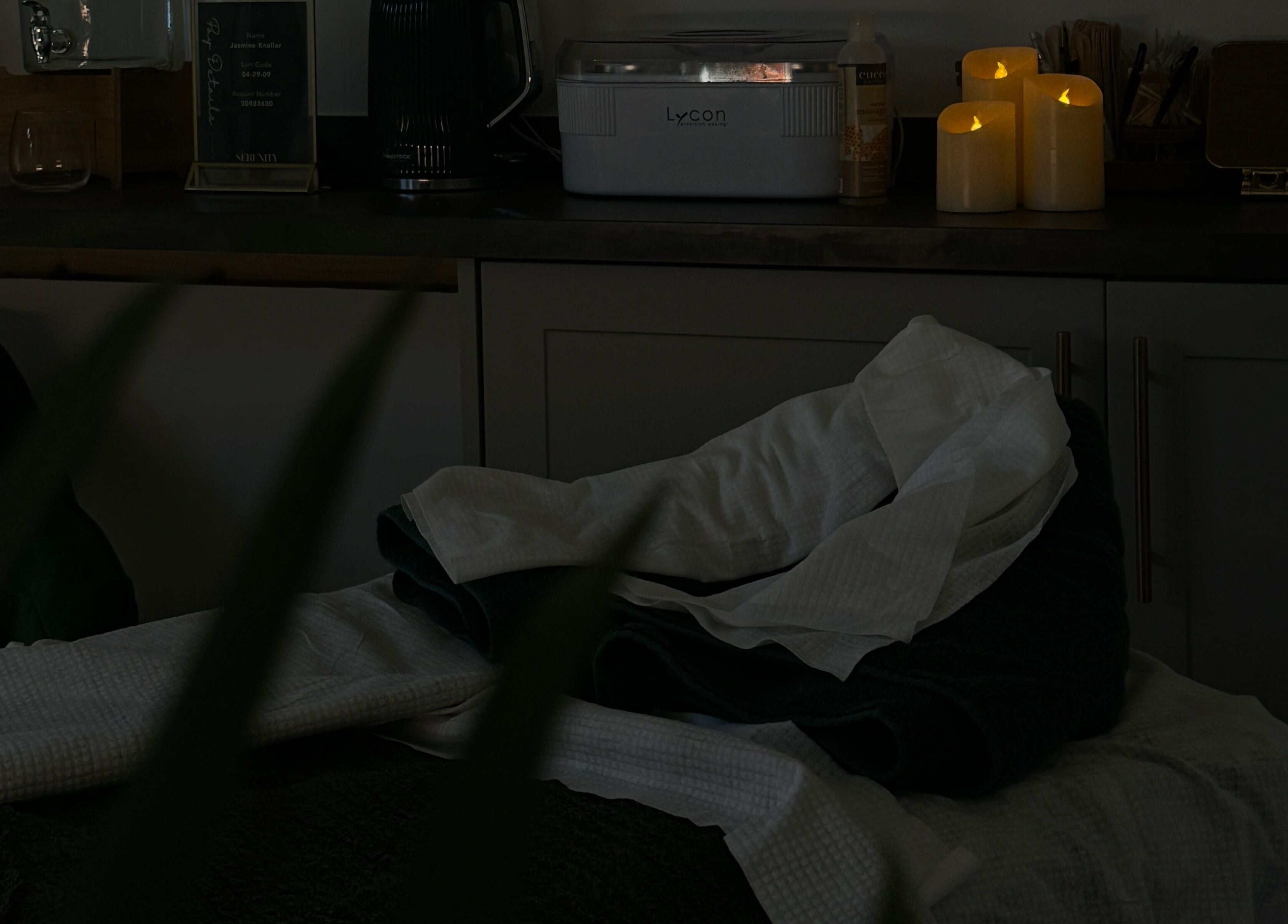 Relaxing spa setup with candles at The Serenity Salon, Fareham, England, GB enhancing tranquility.