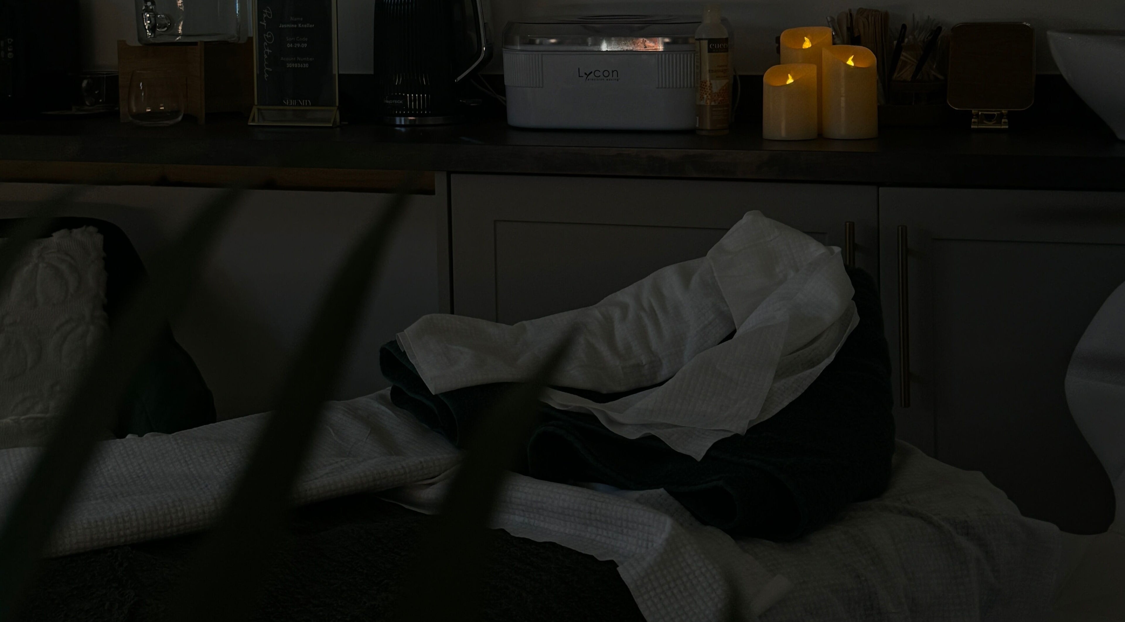 Relaxing spa setup with candles at The Serenity Salon, Fareham, England, GB enhancing tranquility.