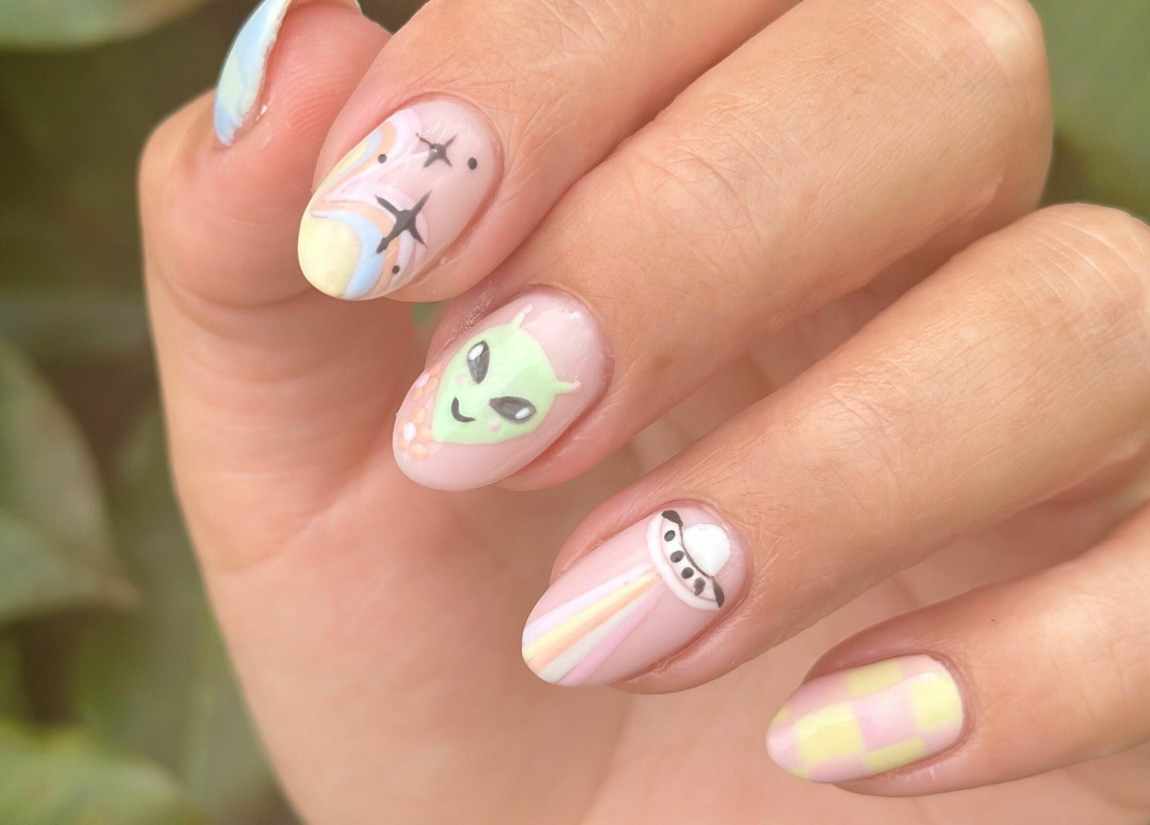 Alien-themed nail art from Nail Alley, Waipu, Northland, NZ, showcasing creative design and expert manicure.