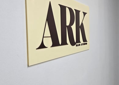 Elegant Ark Hair Studio sign in Melbourne, Victoria, AU, showcasing the venue's stylish branding.