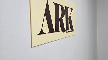 Elegant Ark Hair Studio sign in Melbourne, Victoria, AU, showcasing the venue's stylish branding.