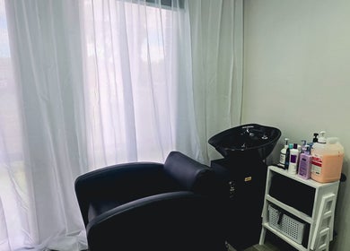 Modern hair washing station at Ark Hair Studio, Melbourne, Victoria, AU, bathed in natural light.